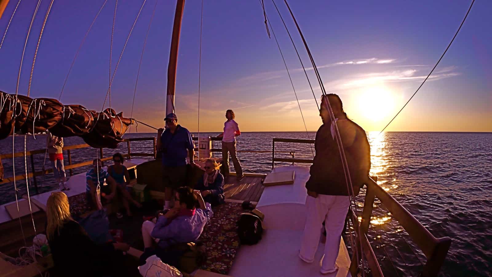 The sun settles on the western horizon on a sunset cruse on the charter catamaran Mon Tiki, photo by Sailing Montauk