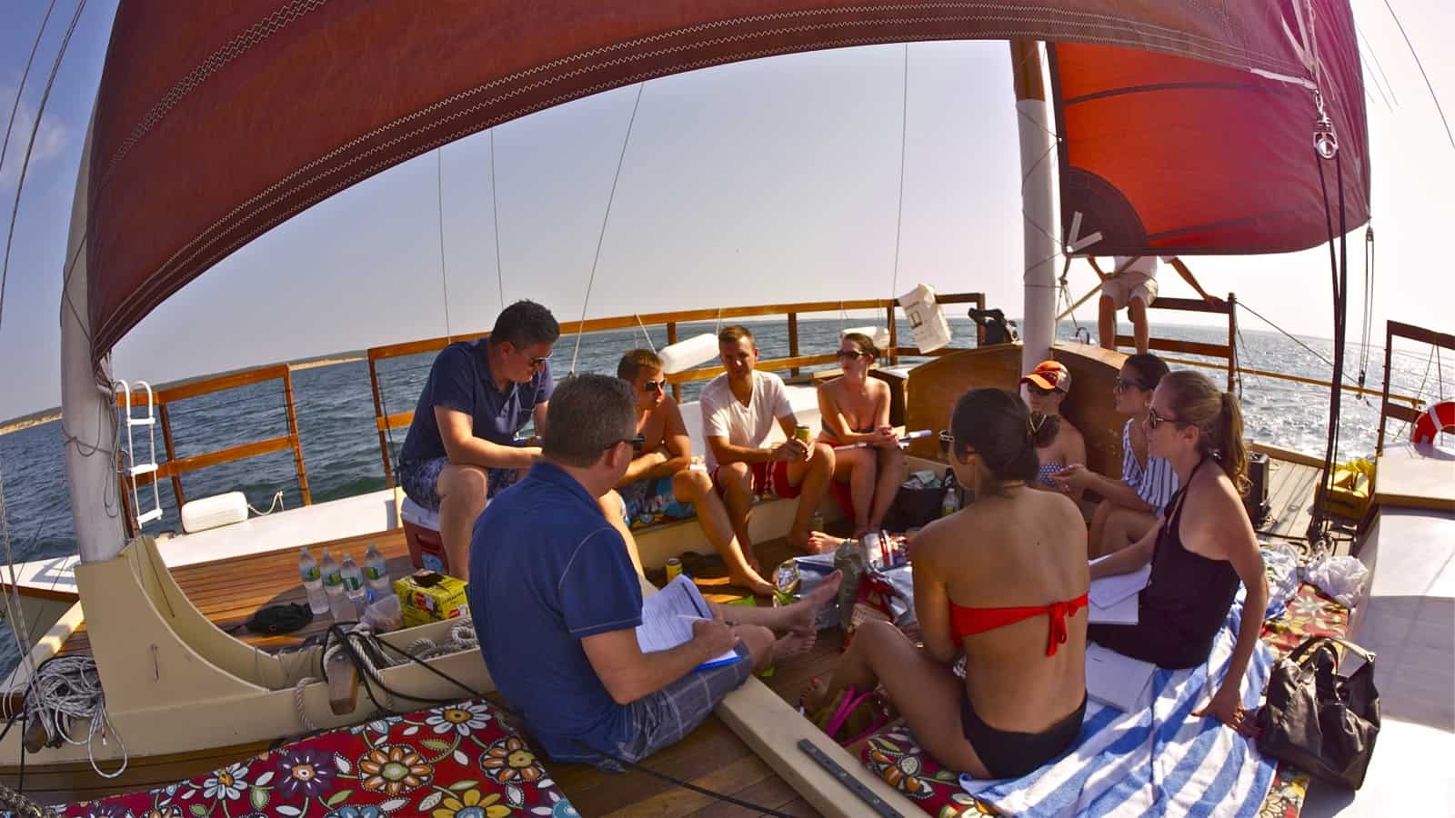 Corporate off-site meeting takes place under full sail on the charter catamaran Mon Tiki, photo by Sailing Montauk